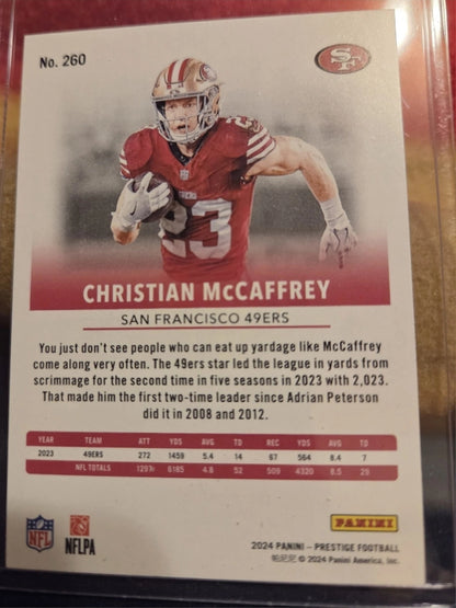 2024 Panini Prestige - Christian McCaffrey #260 Xtra Points Red /999