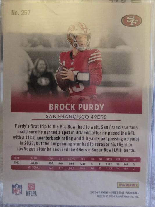 2024 Panini Prestige - Brock Purdy #257 Xtra Points Sunburst
