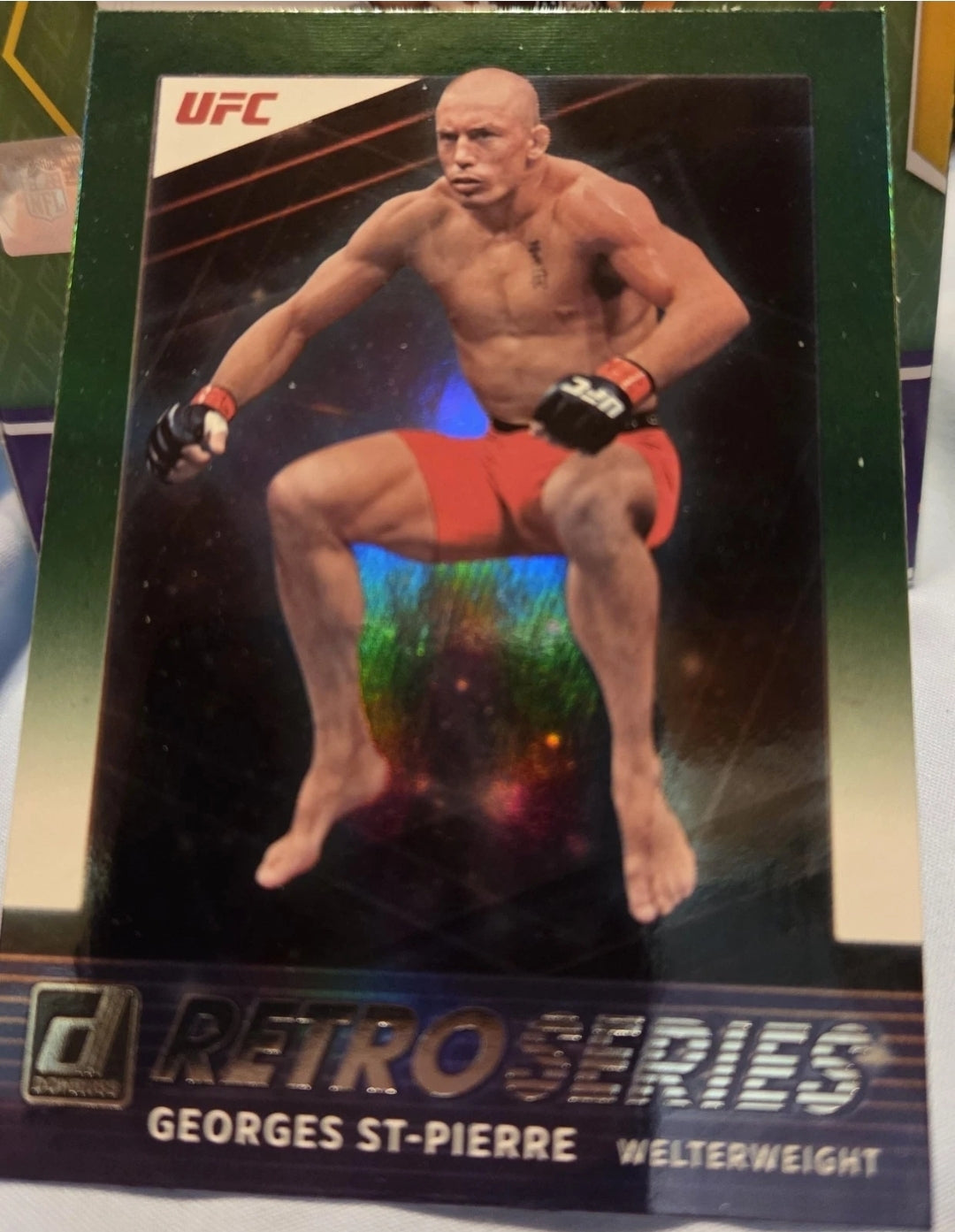 2022 Donruss UFC - Retro Series Georges St-Pierre #5 Green Flood